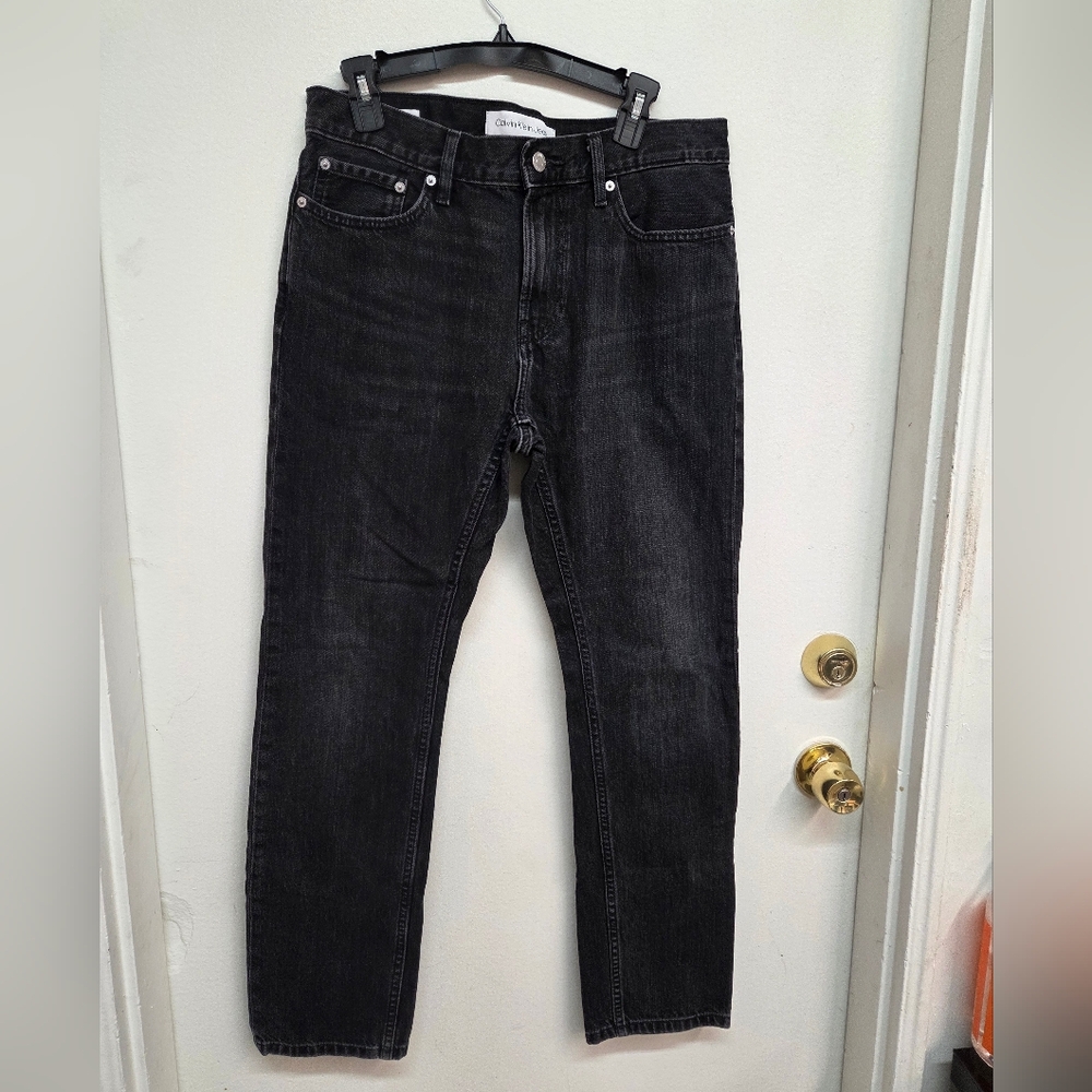 Calvin Klein Men’s Black Slim Straight Jeans.